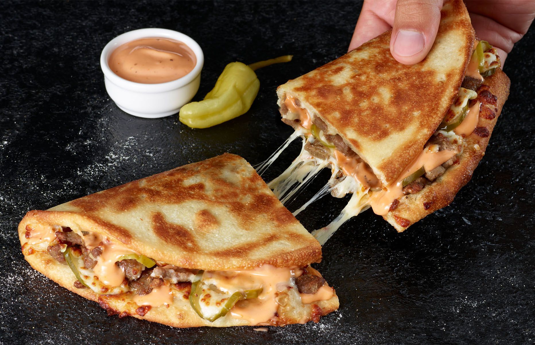 Papa John's Introduces their New Double Cheeseburger Papadia at Select Locations Papa John's Introduces their New Double Cheeseburger Papadia at Select Locations
