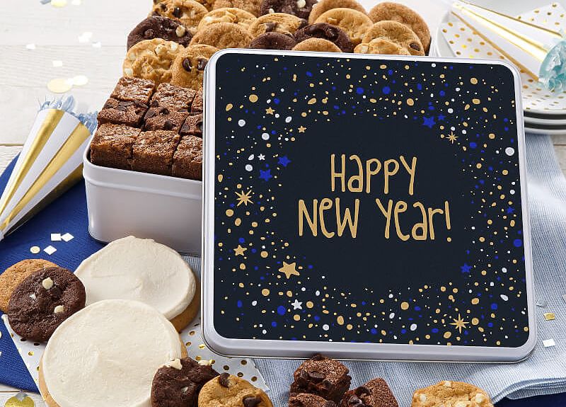 Happy New Year's Cookie Tins and Cookie Cakes Arrive at Mrs. Fields for a Limited Time Happy New Year's Cookie Tins and Cookie Cakes Arrive at Mrs. Fields for a Limited Time