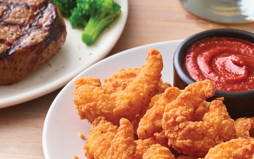 Get a Dozen Double Crunch Shrimp for Only $1 with a Steak Entree Purchase at Applebee's Get a Dozen Double Crunch Shrimp for Only $1 with a Steak Entree Purchase at Applebee's