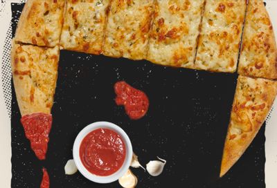 Get 31% Off on 1 Order of Vampire Bread (Cheesy Garlic Bread) Through to Halloween at MOD Pizza