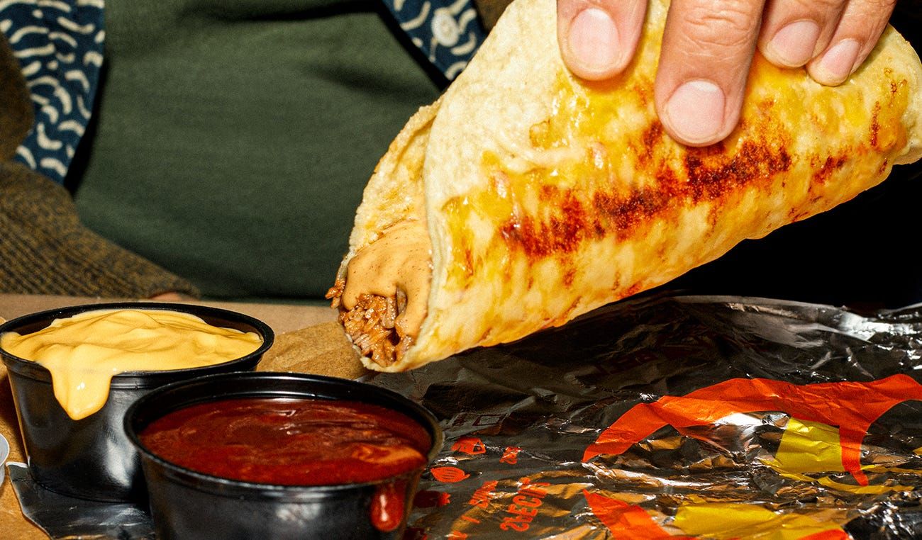 Taco Bell Creates the New Shredded Beef Grilled Cheese Dipping Taco Taco Bell Creates the New Shredded Beef Grilled Cheese Dipping Taco