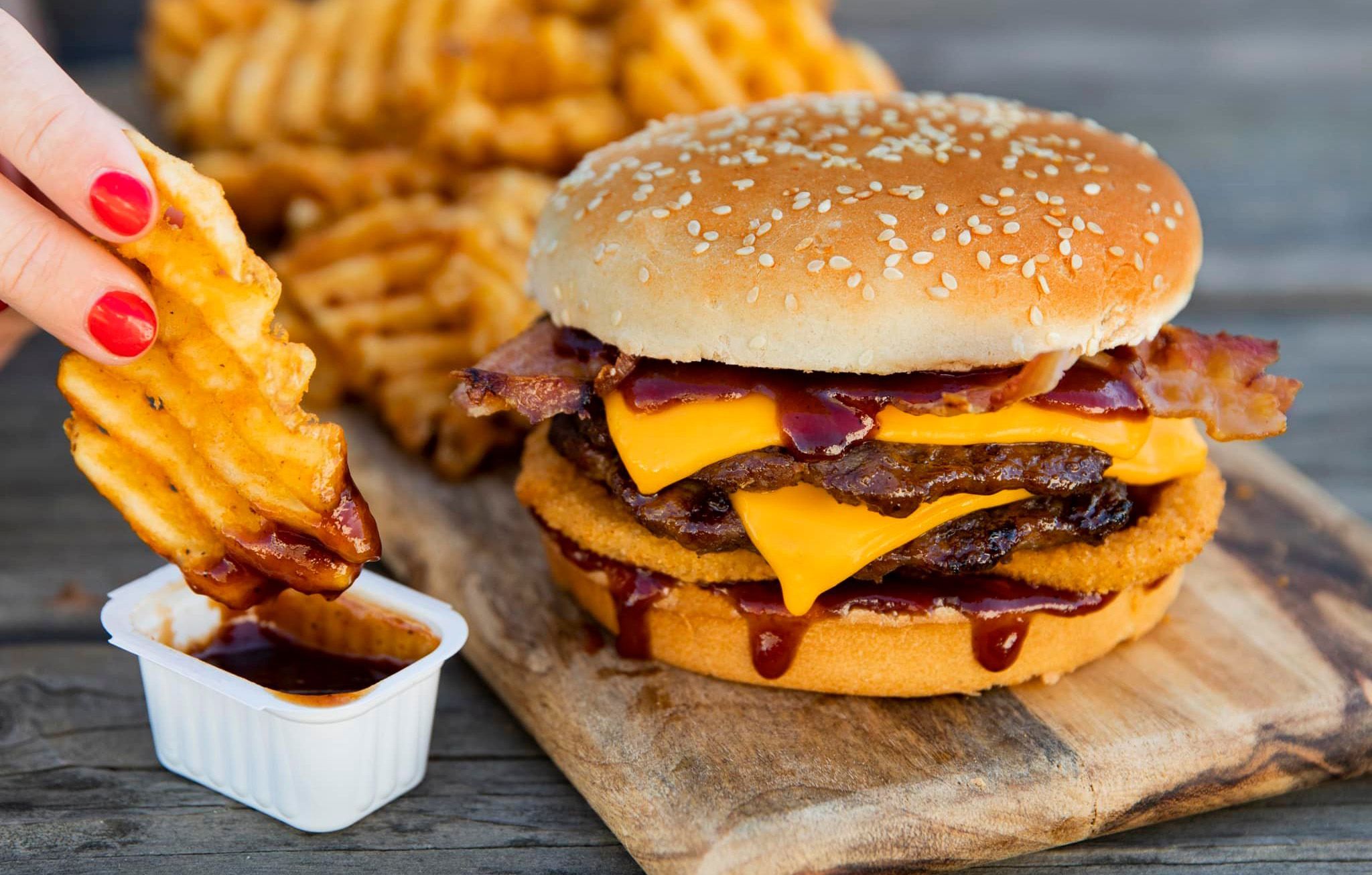 Buy a $25 Gift Card Online at Carl’s Jr. and Get a Free Double Bacon Western Cheeseburger: A Rewards Exclusive Buy a $25 Gift Card Online at Carl’s Jr. and Get a Free Double Bacon Western Cheeseburger: A Rewards Exclusive
